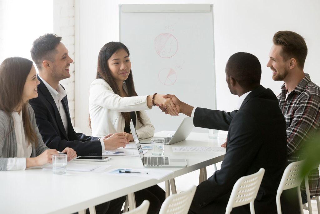 diverse work colleagues having a productive meeting