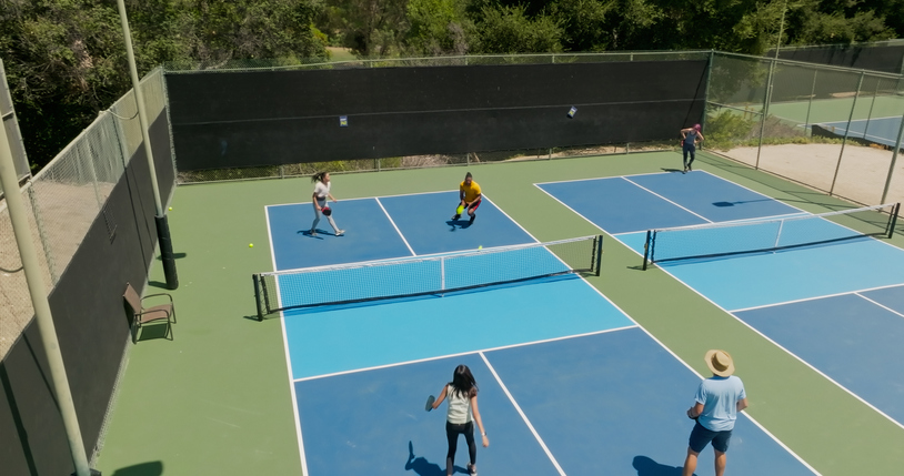 pickleball games on sunny day aerial